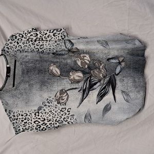 Size 2X+ Model France long leopard and floral print top with bling. Black&grey
